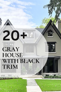 Elegant Victorian-style gray house with black trim and a well-manicured lawn. Gray On Gray Exterior House, Front Door Colors With Gray Siding And Black Shutters, Gray House Brown Trim, Grey House With Black Garage Door, Dark Gray Black Trim House Exterior, Exterior House Colors With Black Garage Doors, Gray Black House Exterior, House Exterior Black And Wood, Black Windows Grey Siding