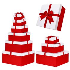 a stack of red and white boxes with a bow