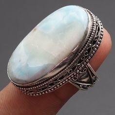 Natural Larimar Gemstone Ring, Vintage Style Ring Jewelry, Gift For Her Ring, Sterling Silver Plated, Gemstone Ring, Gift For Him Ring Materials  Sterling Silver Plated Ring US Size 9 Stone Name Natural Larimar Stone Color Sky Blue Shipping Policy We do ship through DHL, UPS, INDIA POST.  I make the gemstones myself for my valued customers so I assure you that the gemstones are Natural and are made from ethically sourced roughs. The rest of the Ring is made from 925 Sterling silver Plated 92.5% White Larimar Gemstone Jewelry, Handmade White Larimar Jewelry, White Larimar Round Jewelry, Turquoise Larimar Ring Gift, Larimar Turquoise Ring Gift, Larimar Turquoise Ring Gemstone Gift, Wedding Larimar Gemstone Rings, Gift Turquoise Larimar Ring, Larimar Gemstone Jewelry For Wedding