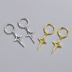 These earrings embody a delicate balance between modern charm and timeless allure, showcasing intricately crafted hollow star pendants that gracefully dangle and capture the light. Brown One Piece, Solid Necklace, Purple One Piece, Stars Earrings, Silver Gold Earrings, Silver Star Earrings, White Short Dress, Silver Style, Fashion Pattern