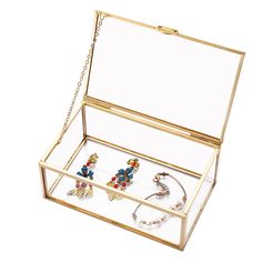 an open jewelry box on a white background