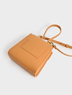 Looking for a pretty statement bag? Look no more. In a punchy shade of pumpkin orange, this geometric top handle bag offers a modern touch to your outfits while letting you access your belongings with ease, thanks to the push-lock closure. Carry it either as a handbag or a crossbody, and let it be the finishing touch to an off-shoulder dress and some strappy stiletto heels for a night out. Geometric Top, Strappy Stilettos, Statement Bag, Size Chart For Kids, Charts For Kids, Pumpkin Orange, Printables Kids, Handle Bag, Belt Size