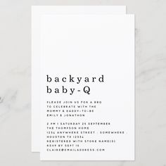 the back yard baby q card is shown on top of a white marble countertop