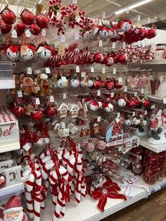 christmas decorations are on display in a store