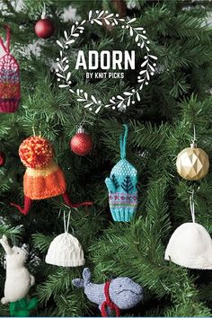 knitted christmas ornaments hanging from a tree with the words adorn written above them