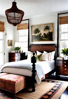 a bedroom with a bed, dressers and paintings on the wall above it's headboard