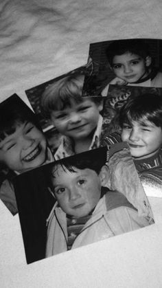 six black and white photos of children on a bed with the sheets pulled back over them