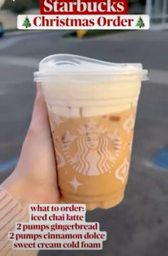 someone holding up a starbucks cup with information about the drink in it and instructions on how to order