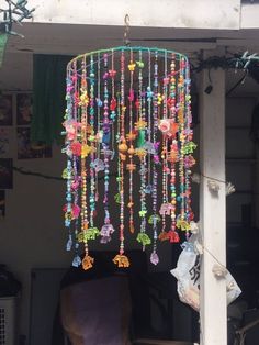 a multicolored wind chime hanging from the ceiling