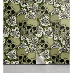 a wallpaper with skulls and roses on it