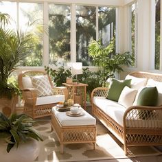 a sun room with wicker furniture and potted plants