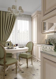 a dining room table with chairs and a chandelier