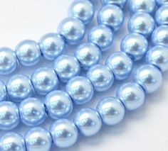 Light Sky Blue Glass Pearl Beads, 8mm Smooth Round These glass pearls are so smooth and lustrous! Their classic round shape will look great in a variety of designs, from cluster earrings to rosaries and wrapped bracelets. Jewelry Making Patterns, Baby Blue Aesthetic, Light Blue Aesthetic, Bridal Tea, Valerian, Diy Crafts Jewelry, Periwinkle Blue, Blue Pearl, Bijoux Diy