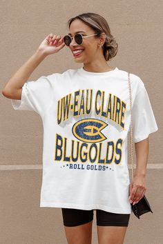 WISCONSIN-EAU CLAIRE BLUGOLDS SHAKEDOWN OVERSIZED CREWNECK TEE Oversized Crew Neck College Style T-shirt, Oversized Crew Neck T-shirt For College, Oversized Collegiate Short Sleeve T-shirt, College Style Short Sleeve T-shirt For Game Day, Oversized Screen Print T-shirt For College, Collegiate Crew Neck T-shirt For Streetwear, Oversized School Spirit T-shirt With Letter Print, Oversized Collegiate T-shirt For College, Crew Neck Slogan T-shirt For College