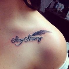 a woman's chest with the words stay strong written in cursive writing