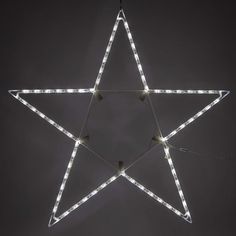 a lighted star hanging from the ceiling