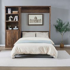 a bed sitting in a bedroom next to a book shelf