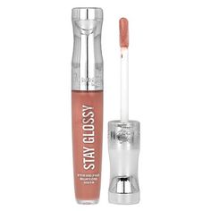 High Shine Lip GlossMoisturizing Lip Gloss Gives Your Lips a Beautiful, Shiny LookProvides Up to 6HRs of Wear for a Long-Lasting, Bold FinishNon-Sticky, Lightweight FormulaIdeal for Wearing Alone or Over LipstickGive your lips a radiant shine by applying the Stay Glossy Lip Gloss from Rimmel. The cutting-edge Shine Extend technology formulated into this shiny lip gloss will give you runway-ready lips and up to six hours of gorgeous color. The Soft Extend, lip-hugging applicator makes it quick an Stay Glossy Lip Gloss, Glossy Lip Gloss, Shiny Lip Gloss, Glossier Lip Gloss, Shiny Lips, Hydrating Lip Gloss, Bare Minimum, Rimmel London, Glossy Lips