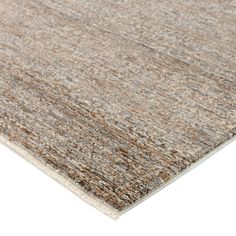 an area rug is shown with different colors and textures on it, including beiges, browns