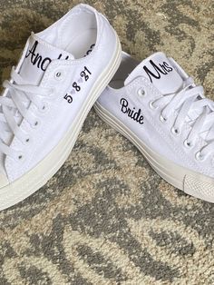 Embroidered White sneakers Getting Married?  What a great idea. This listing is for Mrs on one shoe last name on other shoe. There will be date on the side of 1 shoe and Bride on the side of other shoe !  I will use red hearts in the date unless you specify something else.Other options available in my shop!!Wear these at your reception so your feet don't hurt. You can do white to match your dress or coordinate with your bridal party. You can even get each person in your bridal party a pair. What White Low-top Wedding Shoes For Bride, White Low-top Bridal Sneakers, Customizable Low-top Wedding Shoes For Bride, White Embroidered Lace-up Sneakers, White Wedding Sneakers With Custom Embroidery, Bride Shoes Low, Groom Shoes Wedding, Embroidered Sneakers, Embroidered Converse