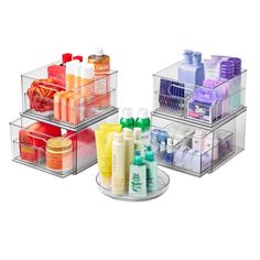 three clear plastic containers with different types of items in each container on the bottom one is filled with soap, shampoo and lotion