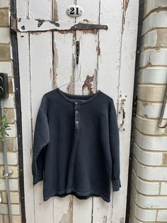 Antique vintage French dark grey warm cotton top size S/M. 100% Cotton. Dyed black/dark grey. Scoop neckline with button tab, ribbed cuffs. Size:  Chest: 44 inches; Shoulder to shoulder: 21 inches; Sleeve length: 20 inches; arm inseam: 18.5 inches; Length: 27 inches. Weight: allow up to 1 kg once packed. Reasonable vintage condition - some very slight bobbling but overall fine and all part of its charm and character. Priced accordingly. Vintage France, Linen Skirt, Brushed Cotton, Cotton Top, Vintage French, Cotton Tops, Antique Vintage, French Vintage, Womens Clothing Tops