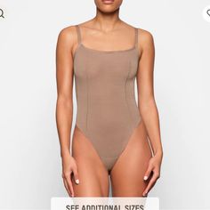 Color Is Sienna Casual Fitted Bodysuit With Adjustable Straps, Casual One-piece Bodysuit With Adjustable Straps, High Cut Bodysuit, Ribbed Knit Bodysuit, Scoop Neck Bodysuit, Square Neck Bodysuit, Tank Bodysuit, Mesh T Shirt, High Neck Sleeveless