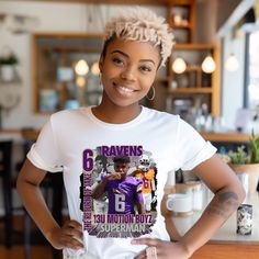 a woman standing in front of a counter wearing a t - shirt with the number six on it