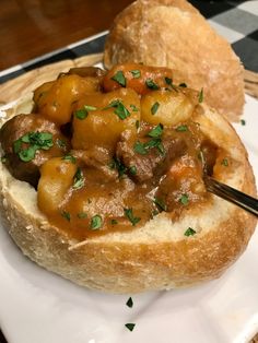 a close up of a plate of food with bread