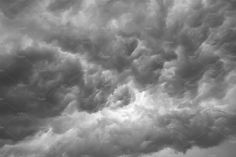 black and white photo of clouds in the sky