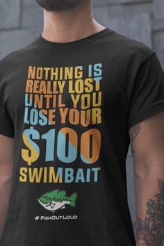 When you lose your favorite $100 swimbait. Remember, you're just one cast away. Link to women's tshirt - https://www.etsy.com/listing/1104203440 Link to YouTube FishOutLoud - https://bit.ly/YouTubeFOLa Please Note: We do not charge shipping EVER and we offer the highest quality, highest customer review shirts anywhere. This classic unisex jersey short sleeve tee fits like a well-loved favorite. Soft cotton and quality print make users fall in love with it over and over again. These t-shirts have-ribbed knit collars to bolster shaping. The shoulders have taping for better fit over time. Dual side seams hold the garment's shape for longer. .: 100% Airlume combed and ringspun cotton (fiber content may vary for different colors) .: Light fabric (4.2 oz/yd² (142 g/m .: Retail fit .: Tear away l Cheap Ribbed Fitted T-shirt, Cheap Unisex Short Sleeve T-shirt, Cheap Casual T-shirt For Fishing, Cheap Fun Men's Tops, Cheap Fun T-shirt For Gift, Cheap Women's Ribbed Short Sleeve Top, Cheap Fitted Ribbed T-shirt, Cheap Ribbed Short Sleeve Tops, Cheap Ribbed Short Sleeve Top For Women