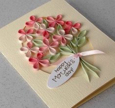 a handmade birthday card with pink and green flowers