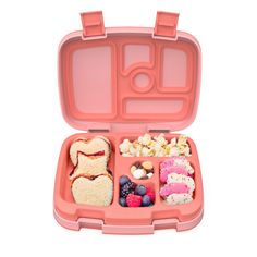 a pink lunch box filled with lots of food