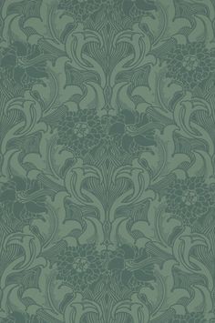 a green wallpaper with an intricate design