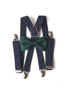 Your guy will look so handsome when he shows up wearing this emerald green bow tie and navy suspender set! Our cotton bow tie and elastic suspenders set is a great choice for family photos, wedding, ring bearer outfit, birthday celebration or any other special occasion. **Please Specify Above** SET- Bow Tie and Suspenders SUSPENDERS- One Pair of our Quality Suspenders BOW TIE- clip-on style/or pre-tied style Baby: newborn- 1Y * Bow Tie: 3in wide * Suspenders: Elastic, X- Back, 8in- 16in Toddle: Groom's Bow Tie With Suspenders, Bow Tie And Suspenders Set For Father's Day Party, Adjustable Green Bow Tie For Father's Day, Dapper Green Bow Tie, Dapper Green Suit And Tie Accessories For Party, Green Dapper Party Suit And Tie Accessories, Green Dapper Bow Tie Suit Accessories, Navy Blue Ring Bearer Outfit, Navy Blue Groomsmen