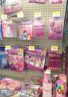 there are many items for sale on the shelves in this store, including toothbrushes and other children's toys