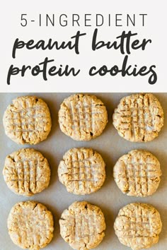 peanut butter protein cookies on a baking sheet with the words, 5 ingredient peanut butter protein cookies