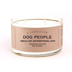 a candle that says dog people smells like unconditional love