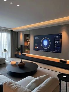 a living room with a large flat screen tv on the wall