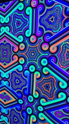 an abstract pattern made up of many different colors and shapes, all in the same color scheme