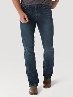 NOTHING BEATS AN ORIGINAL, BUT THIS MIGHT Since 1947, Wrangler® jeans have been a cowboy-approved wardrobe staple. Inspired by our Western heritage, these Wrangler® Retro® jeans combine our most iconic features with contemporary fits and washes. This updated classic features the same worn leather patch with our rope logo, 'W' stitching on the back pockets, and five-pocket styling. These men's slim bootcut jeans feature a streamlined silhouette through the seat, thigh, and knee, but the leg widen Western Style Dark Wash Jeans For Ranch, Dark Wash Jeans With Five Pockets For Ranch, Western Dark Wash Jeans For Rodeo, Classic Dark Wash Jeans For Ranch, Classic Dark Wash Jeans, Casual Straight Leg Jeans For Western-themed Events, Slim Bootcut Jeans, Retro Jeans, Bootcut Jean