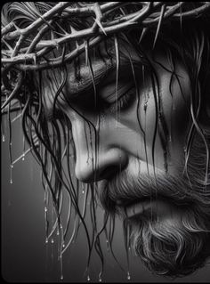 a black and white photo of jesus with his head covered in water dripping from the crown