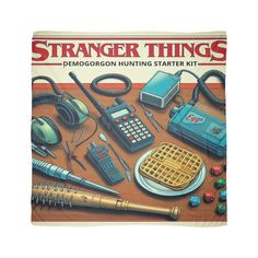 the cover of a game called strange things, with various items on top of it