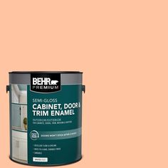 a can of behr premium semi gloss cabinet, door and trim enamel paint on an orange background