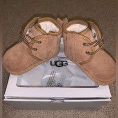 Brand New Baby Ugg Beanie And Boots Gift Set Size S 2/3 (6-12m). Wheat Colored. Purchased From Saks 5th Avenue December 2022. Comes With Original Box. Only Worn Once. Never Touched The Ground. Hat Is O/S Boot Is Size 2/3. Absolutely No Damages, Stains Or Smells Or Discoloration. Comes From A Smoke And Pet Free Home. I Don’t Have The Receipt Anymore Only Proof Of Purchase Is My Online Billing. Ugg Beanie, Toddler Ugg Boots, Baby Ugg Boots, Girls Ugg Boots, Kids Ugg Boots, Chestnut Boots, Girls Winter Boots, Baby Uggs, Black Winter Boots