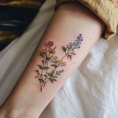 Wildflower Tattoo Sketch Set Dainty Floral Wrist Tattoo, Floral Tattoos On Dark Skin, Small Plant Tattoos For Women, Watercolor Wildflower Tattoo, Wildflower Tattoo Forearm, Wildflower Leg Tattoo, Tattoo Birth Flowers, Tattoo Arm Flower, Sampaguita Flower Tattoo