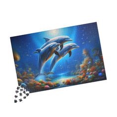 Dive into the enchanting world of the ocean with our "Playful Dolphins" jigsaw puzzle. This stunning puzzle features three joyful dolphins swimming gracefully through a vibrant underwater scene filled with colorful coral reefs and diverse marine life. Perfect for ocean enthusiasts and puzzle lovers, this beautifully illustrated jigsaw puzzle promises hours of relaxing and engaging fun. Ideal for family game nights, as a thoughtful gift, or as a captivating decor piece, this puzzle captures the m Family Night, Ocean Lover, Marine Life, Jigsaw Puzzle