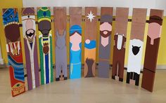 a group of wooden cut outs with different colored designs on them