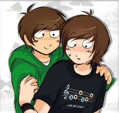 two people are hugging each other with musical notes on their shirts in front of them