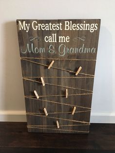 a wooden sign that says, my greatest blessing is call me mom and grandma